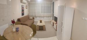 Posedenie v ubytovaní 1 bedroom flat 15 minutes from the sea and downtown
