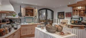 a kitchen with a counter with baskets on it at Hotel Kathrin in Grossarl
