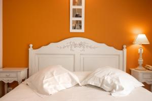 Postel nebo postele na pokoji v ubytování Tulip Inn Honfleur Residence & Spa