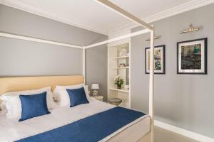 Voodi või voodid majutusasutuse Hotel Vis à Vis toas