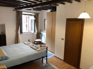 A bed or beds in a room at Casa in Umbria