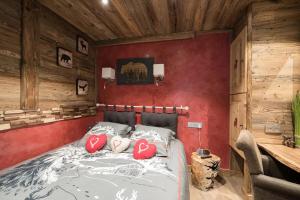 Posteľ alebo postele v izbe v ubytovaní Le nid d'Aigle