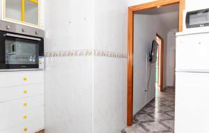 Kuchyňa alebo kuchynka v ubytovaní PISO CENTRICO EN PUNTA UMBRIA