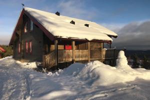 Alpstigen 10A - Newly built sports lodge with amazing views v zimě + 31 fotografií