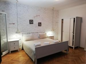 Postel nebo postele na pokoji v ubytování Villa Allegra