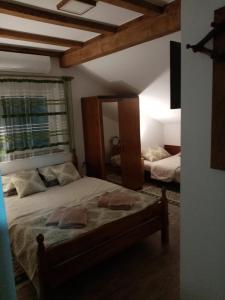 Postel nebo postele na pokoji v ubytování Apartman Konak