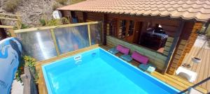 Swimmingpoolen hos eller tæt på Finca Mariposa Mariposaholidays