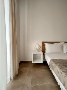 Posteľ alebo postele v izbe v ubytovaní San Michele Luxury Rooms