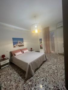 Ένα ή περισσότερα κρεβάτια σε δωμάτιο στο LA CASA DI GIOVANNI