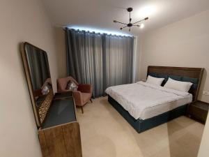 Postel nebo postele na pokoji v ubytování MCJ Luxury 2 Bedrooms Apartment + 15 fotografií