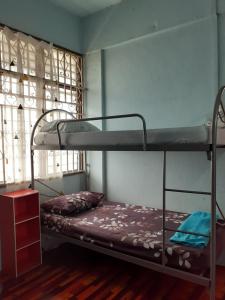 Gambar di galeri bagi Homestay Idaman Tun Hussein - Harga untuk 1 rumah ,1 bilik ,1 bilik air 4 single bed - Not Sharing di Perai