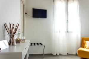 A television and/or entertainment centre at La Silvana B&B