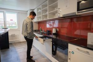 Una cocina o zona de cocina en Nyon Hostel