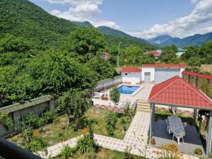 an aerial view of a house with a swimming pool at Mountain Resort House in Gabala