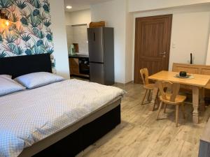 Postelja oz. postelje v sobi nastanitve Apartmány Županovice