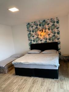 Postelja oz. postelje v sobi nastanitve Apartmány Županovice