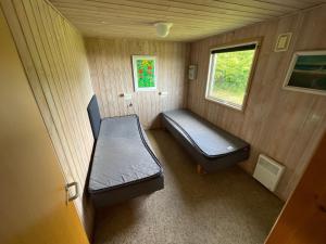 Postel nebo postele na pokoji v ubytování Ældre Sommerhus Max 4 voksne og 4 børn