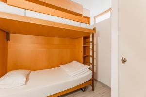 Postel nebo postele na pokoji v ubytování Residenza Lago di Lugano