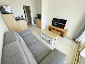 Televízia a/alebo spoločenská miestnosť v ubytovaní #902 MARINA RIVIERA BAY - Marina Baie des Anges
