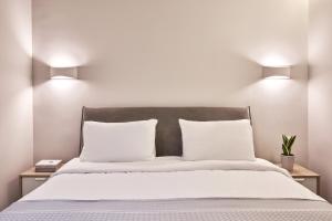 Letto o letti in una camera di Spacious 2bd Apt in Prime Location next to Divani