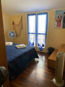 Posteľ alebo postele v izbe v ubytovaní The Shell Apartment