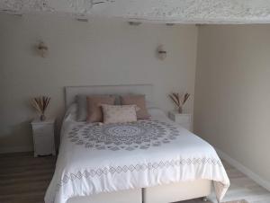 Posteľ alebo postele v izbe v ubytovaní Chambre d'hote Familiale de la maison Bleue