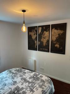 Кровать или кровати в номере Le Teich, appartement coeur de ville