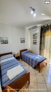 Postel nebo postele na pokoji v ubytování Scala dei Turchi Apartment