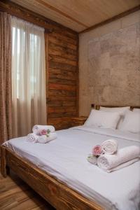 Кровать или кровати в номере DAN Resort