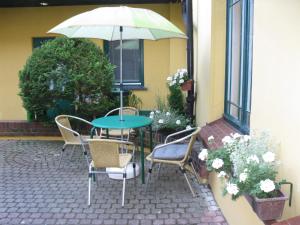 Patio lub wspólna przestrzeń na świeżym powietrzu w obiekcie Hotel Alga