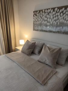 Кровать или кровати в номере Apartment & Rooms Riva