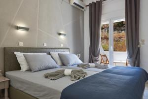 Postel nebo postele na pokoji v ubytování HOTEL ATHINA