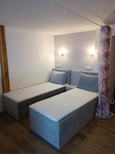 Ein Bett oder Betten in einem Zimmer der Unterkunft Spreewald Ferienwohnung Wollgast