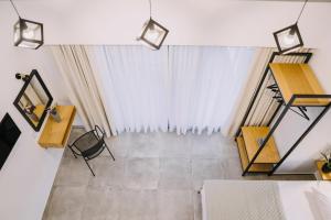 BLUE STONE Luxury Suites客房内的一张或多张床位