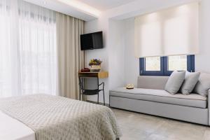 BLUE STONE Luxury Suites客房内的一张或多张床位
