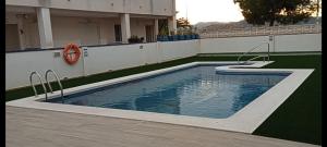 Basen w obiekcie PLAYA ALMARDA CORINTO, PISCINA, WIFI,2 TERRAZAS, BARBACOA,TRANQUILo lub w pobliżu