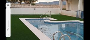 Basen w obiekcie PLAYA ALMARDA CORINTO, PISCINA, WIFI,2 TERRAZAS, BARBACOA,TRANQUILo lub w pobliżu