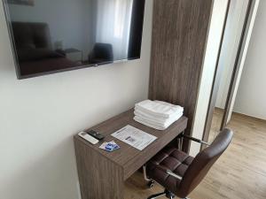 TV a/nebo společenská místnost v ubytování VSuites + 26 fotografií