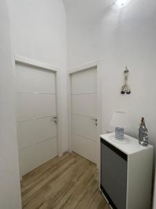White Shell rooms holiday accomodation self check-in tesisinde mutfak veya mini mutfak