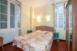 Postel nebo postele na pokoji v ubytování Hotel Villa Provencale