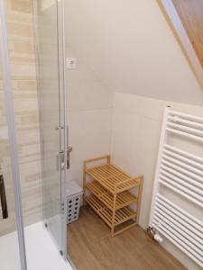 a shower stall in a bathroom with a toilet at Apartment Cvetek Janez in Bohinj +26 photos