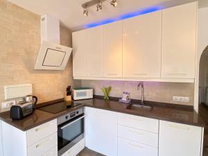 Kuchyň nebo kuchyňský kout v ubytování Litoral Burriana Apartments Casasol