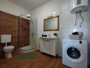 Ванна кімната в Apartman, studio and room Kata