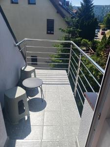 Balkón nebo terasa v ubytování Apartamenty na skarpie