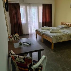 Postel nebo postele na pokoji v ubytování RA Apartmani Vrdnik