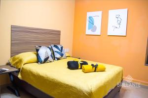 Krevet ili kreveti u jedinici u okviru objekta Condominio Brillante GDL