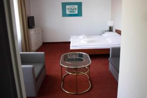 Posteľ alebo postele v izbe v ubytovaní Elita Hotel & Restauracja