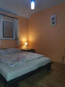 Postel nebo postele na pokoji v ubytování HOSTEL "ARCO"
