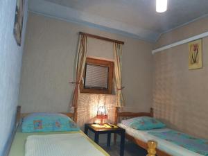 Postel nebo postele na pokoji v ubytování HOSTEL "ARCO"