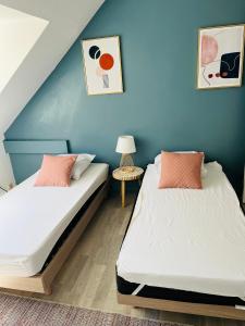 Postel nebo postele na pokoji v ubytování Appartement Cosy en coeur de vieille ville